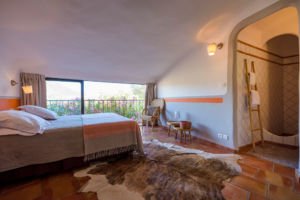 Chambre avec vue jardin de la villa luxe à Porto-Vecchio